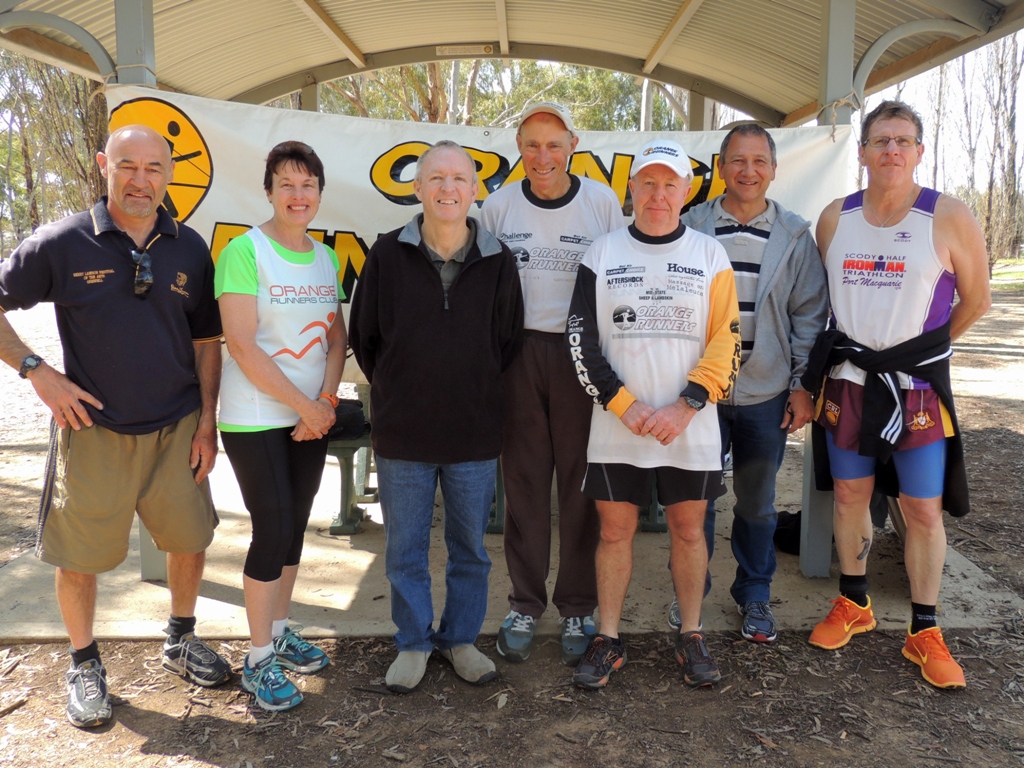 TIME TO REST: Gary Williams, Jane Fairgrieve, Jordan Cheney, Michael Sharp, Graham Fahy, Bill Fairgrieve and Frank Ostini enjoy some time together after last Sunday's run.