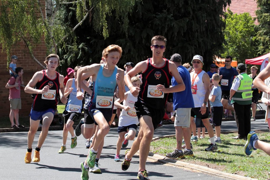 POUNDING THE PAVEMENT: The field gets moving in the Orange Running Festival's 2014 five kilometre.