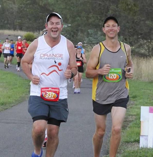 HAPPY FEET: Stewart Vidler (left, with Terry Baker during the 2014 Colour City Running Festival) was in the winning relay team with Anna Daintith.