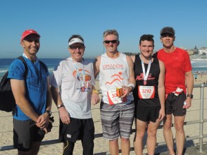 SURF'S UP : Orange Runners Club members from left Mitch Essex, Frank Ostini, Mike cooper, Kyle Ostini and Tony Syme finished the 2015 C2S